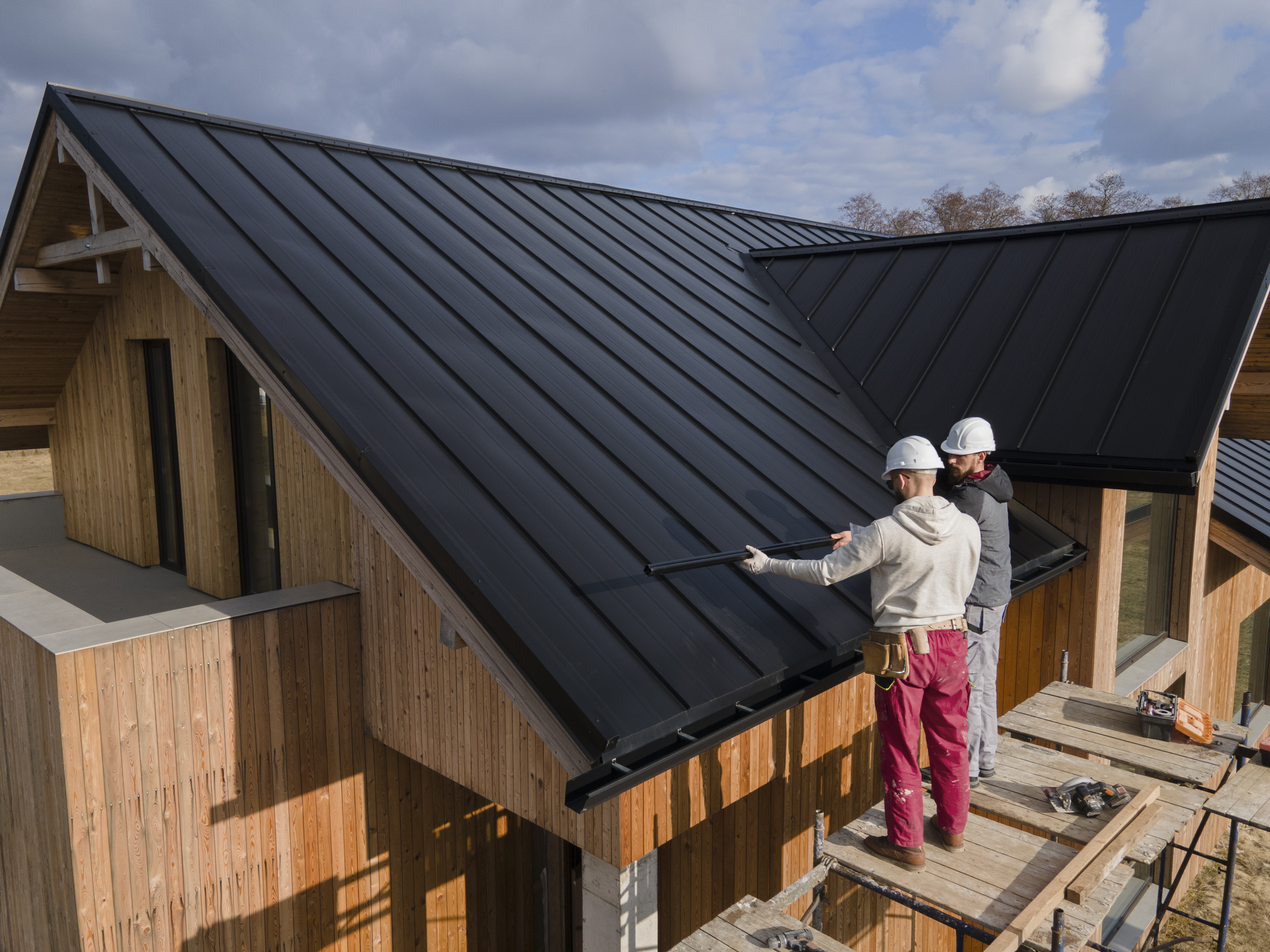 A beautiful house with a new, sturdy roof.